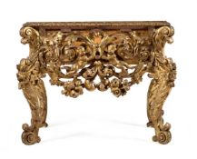 A CARVED GILTWOOD CABINET STAND, CIRCA 1680 AND LATER