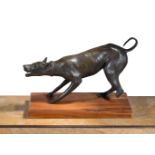 AFTER THE ANTIQUE, A BRONZE FIGURE OF A DOG