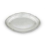 A GEORGE III SILVER SHAPED OVAL MEAT DISH
