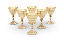 JUSSUF HUSSEIN ABBO, A SET OF SIX SILVER AND SILVER GILT GOBLETS