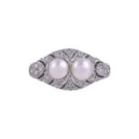 A 1920S DIAMOND AND PEARL DRESS RING