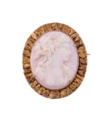 JULES EGGERT, ATLIN, BRITISH COLOMBIA, CANADA, A PROSPECTORS CONCH SHELL CAMEO BROOCH AND BRACELET