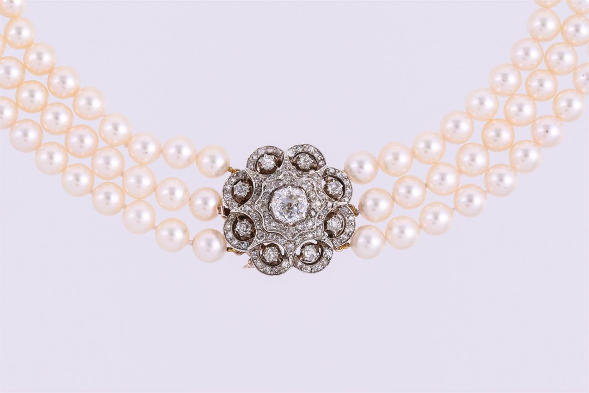 A THREE STRAND CULTURED PEARL NECKLACE WITH A DIAMOND CLUSTER CLASP - Image 2 of 2