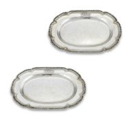 A PAIR OF GEORGE III SILVER SHAPED OVAL PLATTERS