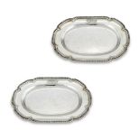 A PAIR OF GEORGE III SILVER SHAPED OVAL PLATTERS