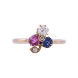 AN EARLY 20TH CENTURY RUBY, SAPPHIRE AND DIAMOND THREE LEAF CLOVER RING