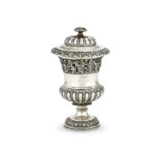 AN INDIAN COLONIAL SILVER CAMPANA SHAPED VASE AND COVER