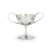 AN EDWARDIAN SILVER TWO HANDLED PEDESTAL CUP