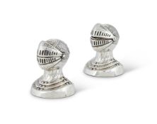 A PAIR OF VICTORIAN SILVER NOVELTY PEPPER POTS MODELLED AS KNIGHT'S HELMETS