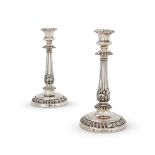 A PAIR OF GEORGE IV SILVER CANDLESTICKS