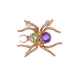 AN EDWARDIAN PERIDOT, AMETHYST AND RUBY SPIDER BROOCH CIRCA 1910