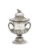 AN INDIAN COLONIAL SILVER CAMPANA CUP AND COVER
