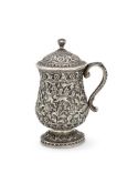 AN INDIAN SILVER CUP AND COVER