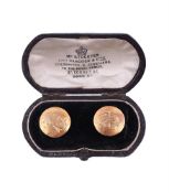 A CASED PAIR OF 18 CARAT GOLD BUTTONS