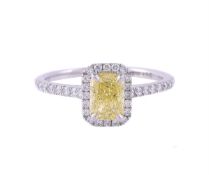 A FANCY INTENSE YELLOW DIAMOND AND DIAMOND CLUSTER RING, LONDON 2020