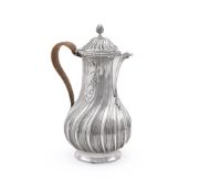 A GEORGE III SILVER BALUSTER HOT WATER POT