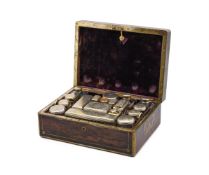 A WILLIAM IV TRAVELLING TOILET CASE WITH SILVER MOUNTED FITTINGS