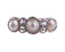 A HALF PEARL AND DIAMOND SEVEN STONE RING