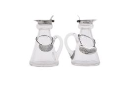 A PAIR OF SILVER MOUNTED WHISKEY NOGGINS, HUKIN & HEATH LTD.