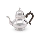 A SILVER BALUSTER TEA POT