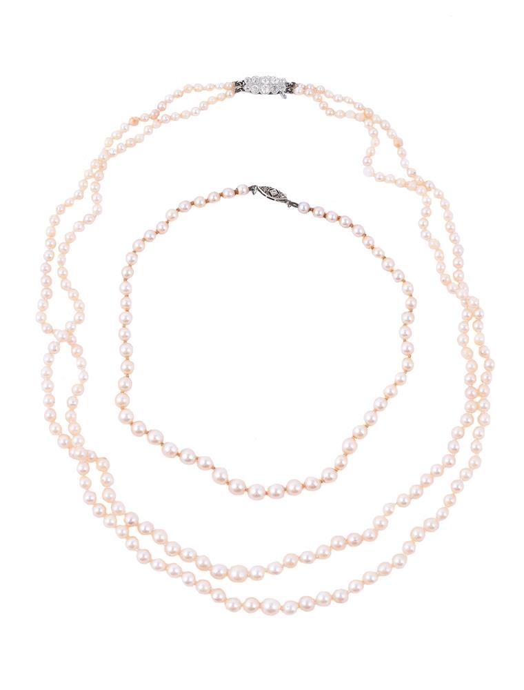 A CULTURED PEARL NECKLACE WITH A DIAMOND CLASP