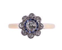 A SAPPHIRE AND DIAMOND FLOWERHEAD CLUSTER RING