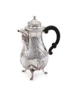 A CONTINENTAL SILVER COLOURED BALUSTER JUG