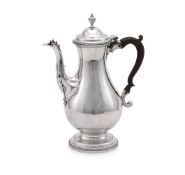 A GEORGE III SILVER BALUSTER COFFEE POT, JOHN LAMBE