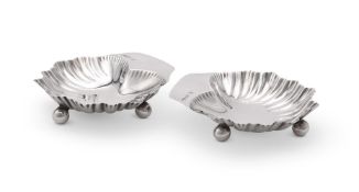 A PAIR OF VICTORIAN SILVER SHAPED BUTTER DISHES