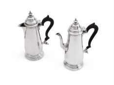 A MATCHED PAIR OF SILVER CAFE AU LAIT POTS