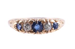 AN EARLY 20TH CENTURY SAPPHIRE AND DIAMOND FIVE STONE RING