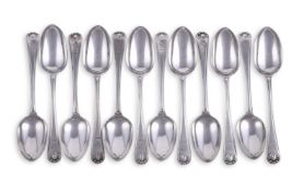 A SET OF TWELVE VICTORIAN SILVER FIDDLE, THREAD & SHELL PATTERN DESSERT SPOONS