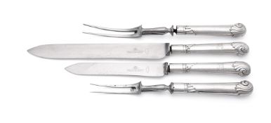 A VICTORIAN SILVER HANDLED FOUR PIECE CARVING SET