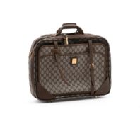 GUCCI, A MONOGRAMMED COATED CANVAS TRAVEL CASE