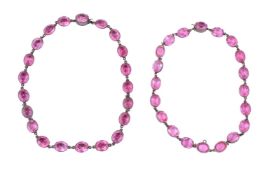 TWO PINK SYNTHETIC STONE NECKLACES