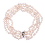 A DIAMOND AND CULTURED PEARL NECKLACE