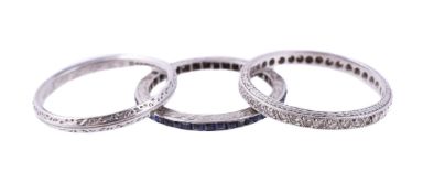 TWO GEM SET 1920S ETERNITY RINGS AND A 1940S BAND RING