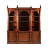 A MAHOGANY BOOKCASE IN GOTHIC TASTE