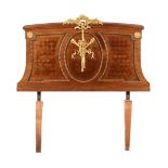 A FRENCH WALNUT PARQUETRY AND GILT METAL MOUNTED SINGLE HEADBOARD