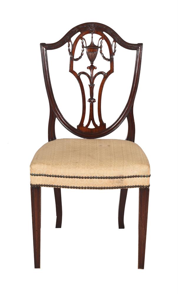 TWO SIMILAR MAHOGANY AND UPHOLSTERED SIDE CHAIRS IN THE MANNER OF GEORGE HEPPLEWHITE