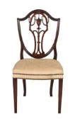 TWO SIMILAR MAHOGANY AND UPHOLSTERED SIDE CHAIRS IN THE MANNER OF GEORGE HEPPLEWHITE