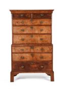 A GEORGE I WALNUT AND OAK CHEST ON CHEST