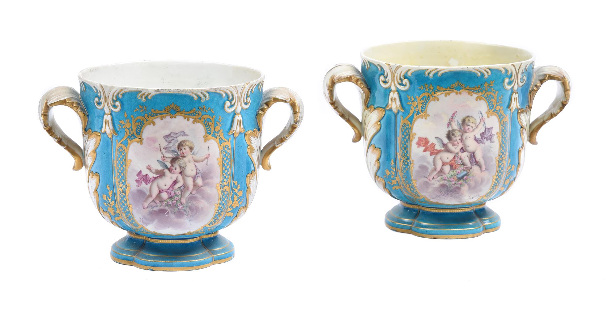 A PAIR OF SEVRES STYLE BLEU CELESTE SEAUX A DEMI-BOUTEILLES