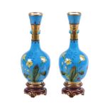 MINTON, PROBABLY CHRISTOPHER DRESSERA PAIR OF AESTHETIC MOVEMENT BLEU CELESTE GEROUND SLENDER VASES