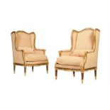 A PAIR OF GILTWOOD AND UPHOLSTERED HIGH BACK ARMCHAIRS