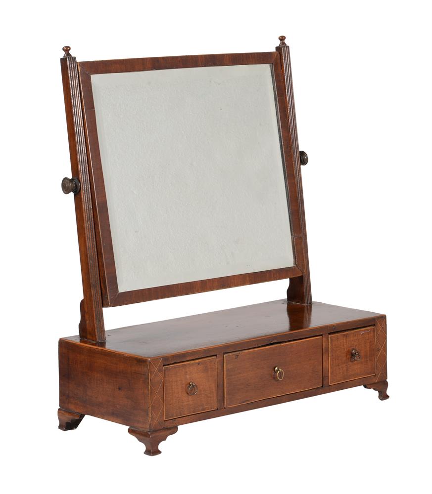 A GEORGE III MAHOGANY AND BOXWOOD STRUNG DRESSING TABLE MIRROR