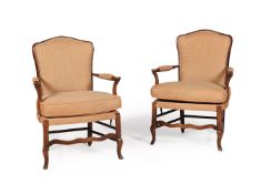 A PAIR OF FRENCH BEECH AND UPHOLSTERED ARMCHAIRS