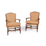 A PAIR OF FRENCH BEECH AND UPHOLSTERED ARMCHAIRS