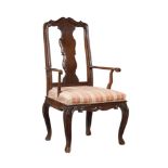 A FRENCH PROVINCIAL WALNUT ARMCHAIR