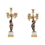 A PAIR OF PATINATED, GILT METAL AND CUT GLASS TABLE CANDELABRA